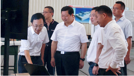 绍兴市人大常委会主任谭志桂一行赴dg视讯精机调研走访